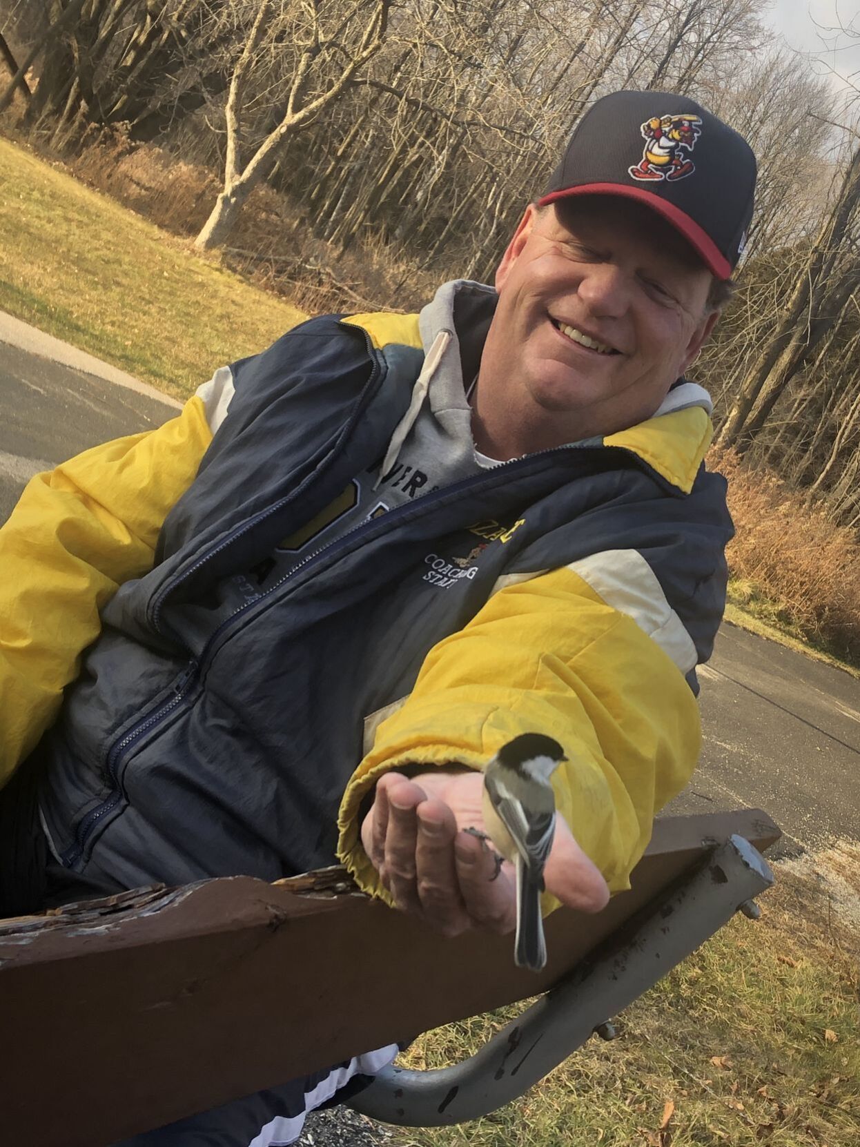Feeding chickadees at Harrington State Park